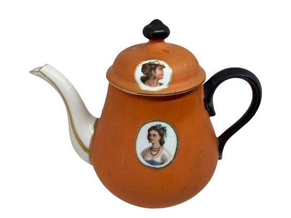 Porcelain coffee pot with ladies on the front and back and on the lid