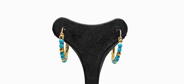 Gold earrings with turquoise beads