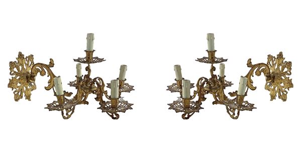 Coppia di applique a cinque luci in bronzo dorato