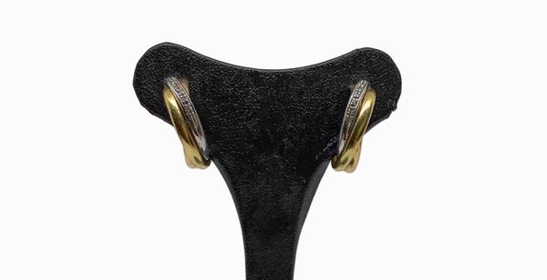 Ring earrings in yellow and white gold