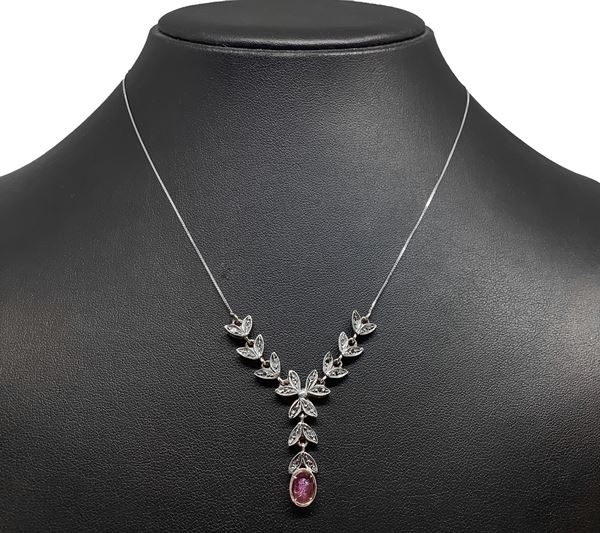 18 carat white gold necklace with central ruby and diamonds