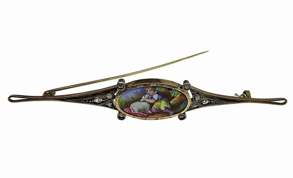 Brooch in 12 karat gold, silver with oval miniature