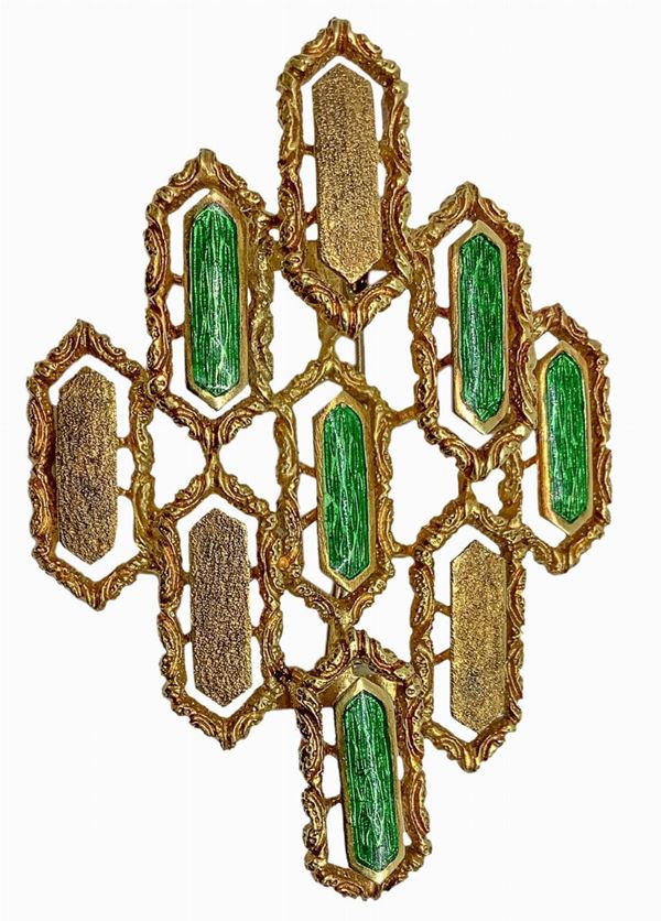 Brooch in 18k gold with green enamels