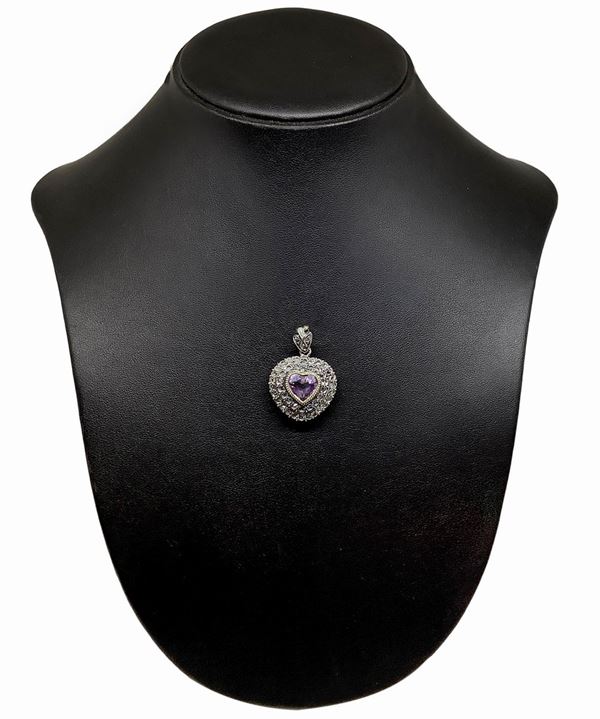 Pendant with heart-shaped amethyst in low title gold and silver, double row of diamonds