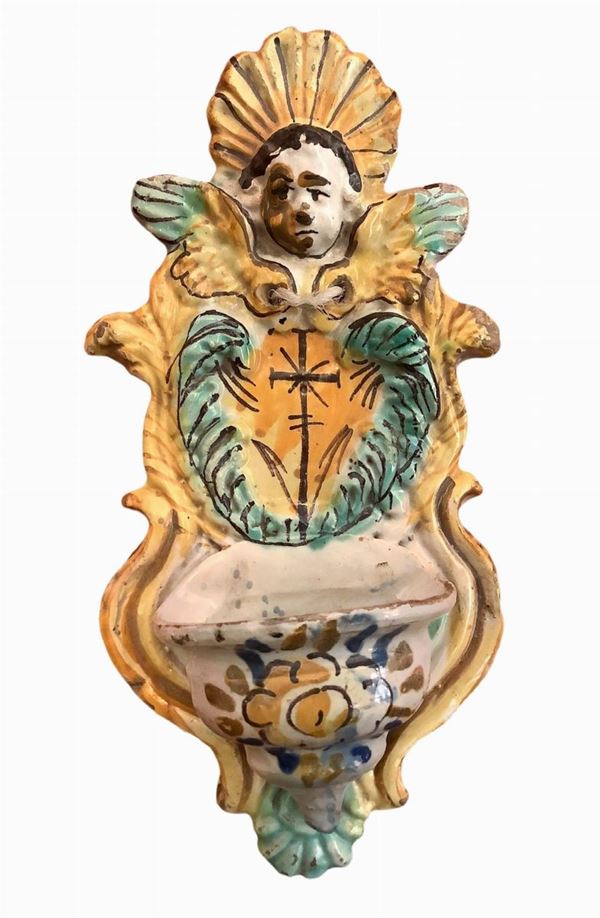 Holy water stoup in Arianese majolica