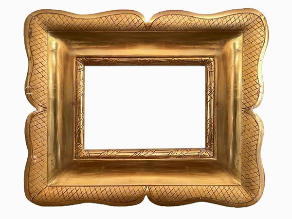 Cornice a vassoio in legno dorato a foglia