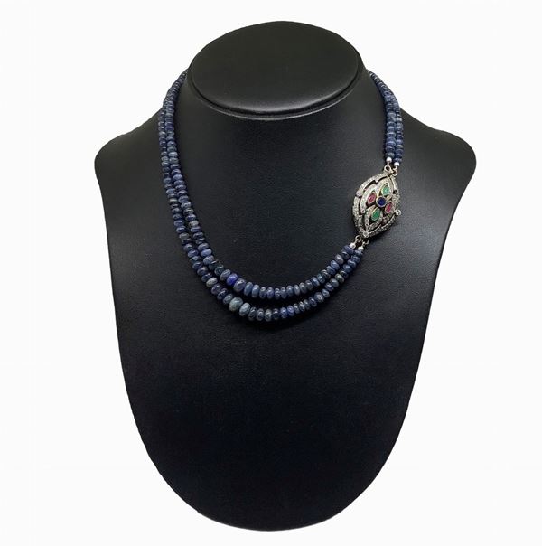 Silver necklace with sapphires and clasp with emeralds and sapphires