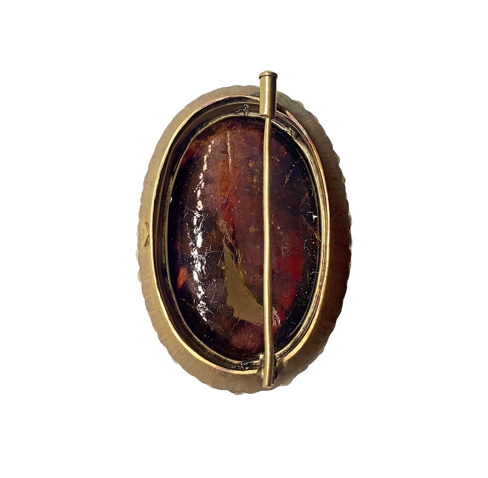 Spilla con ovale in ambra e contornata da perline