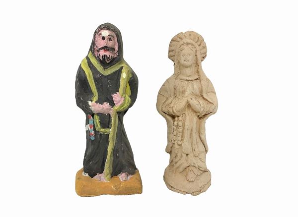 Salvatore Leone - Coppia di fischetti in ceramica di Caltagirone raffiguranti un Santo policromo e una Madonna monocromo