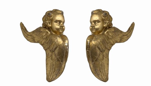 Pair of winged angels, wooden friezes