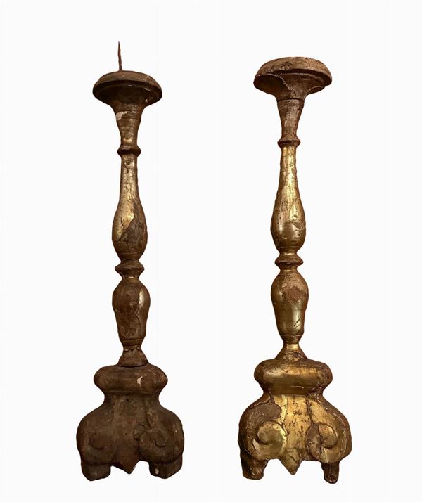 Pair of gilded wood torches