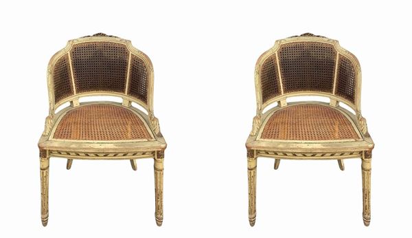 Coppai of lacquered armchairs
