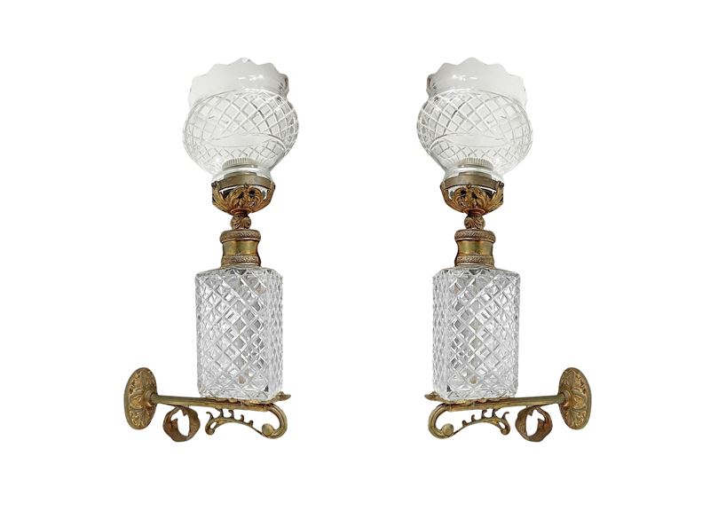 Coppia di appliques in bronzo e vetro