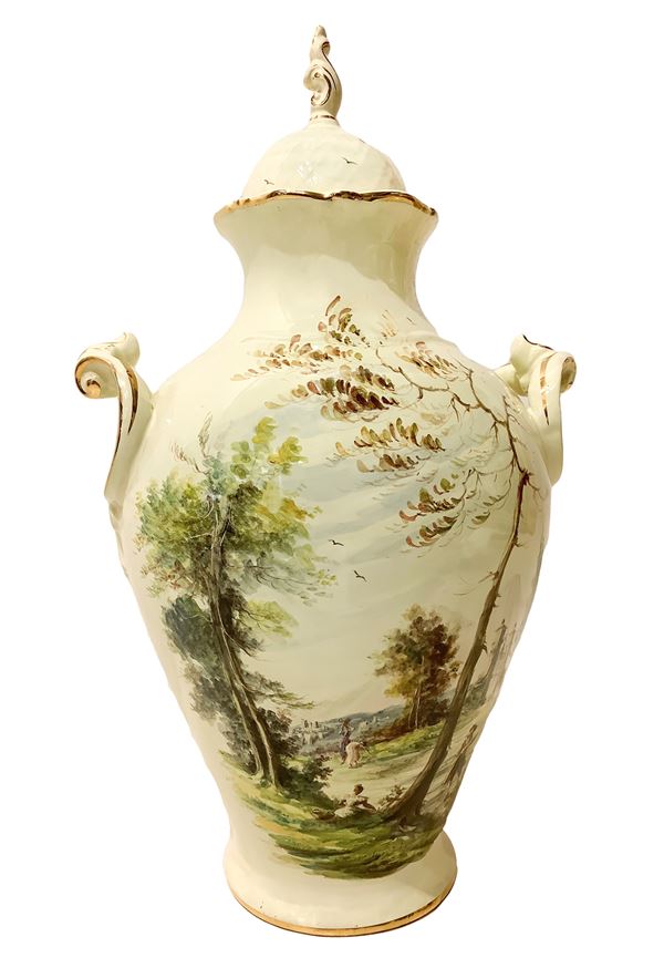 Two-handled ceramic poutiche in shades of straw with countryside landscapes and gold details