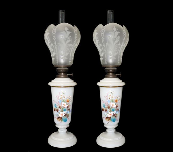 Pair of oil lamps in white opaline hand painted with floral motifs