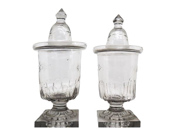 Pair of glass vases with lids