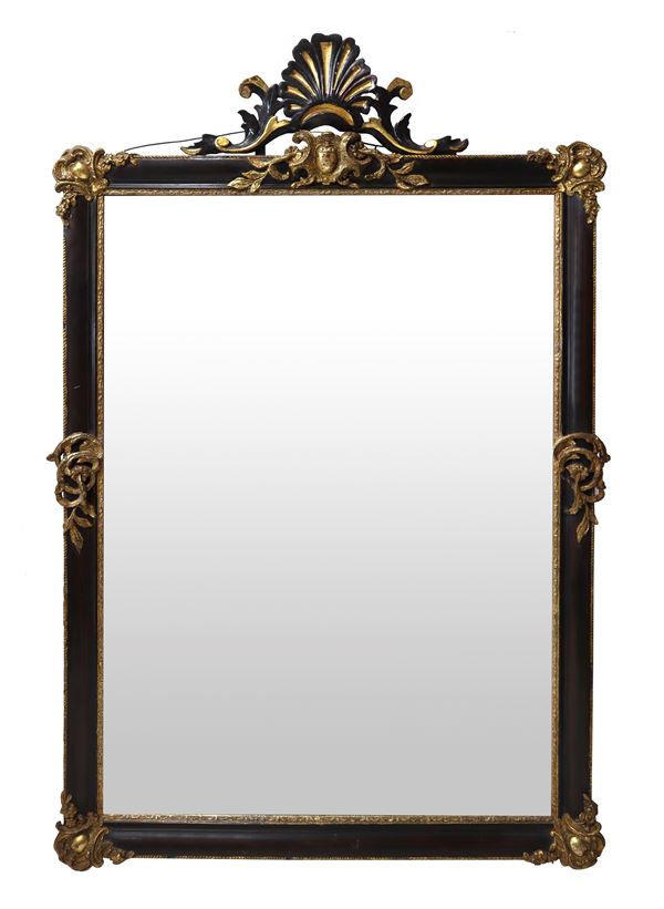 Mirror in lacquered wood with golden applications