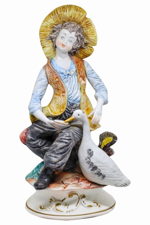 Capodimonte - Young man with goose in porcelain