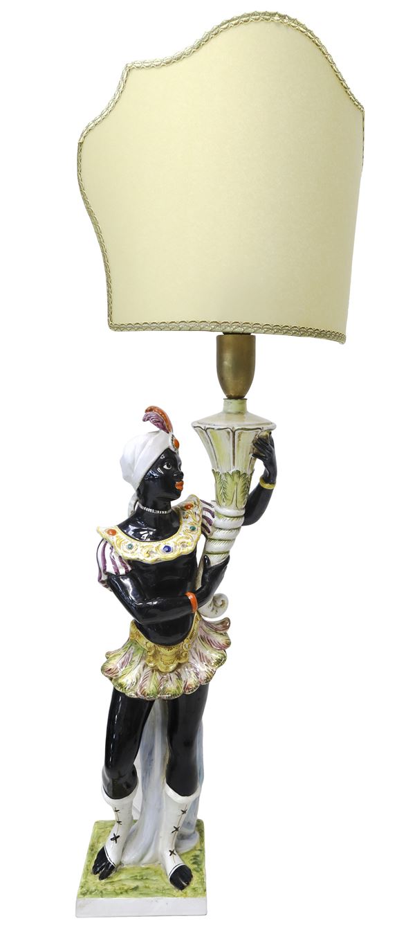 Majolica table lamp depicting a Moor lamp holder.