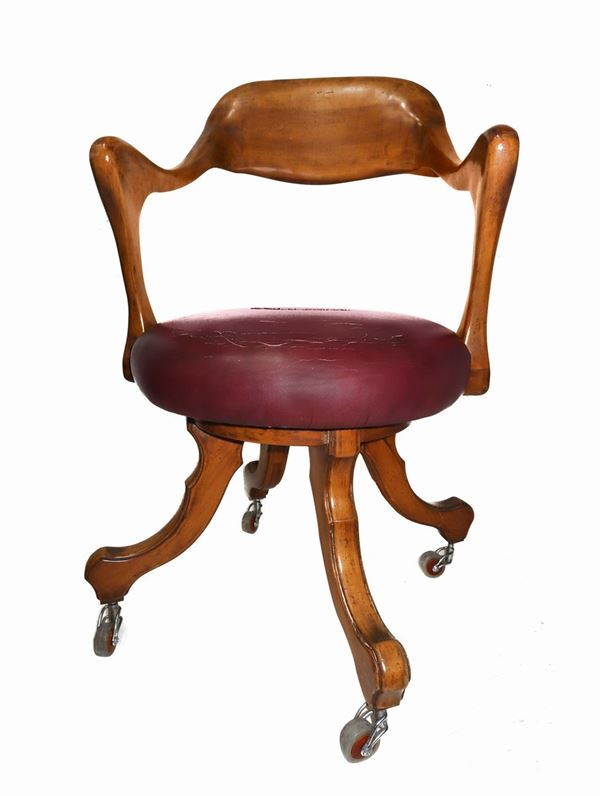 Armchair with wooden structure