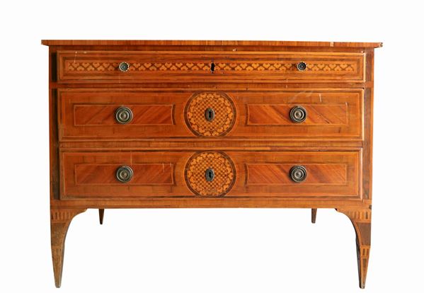 Louis XVI chest of drawers in walnut and light woods