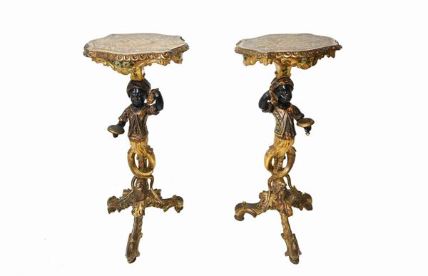 Pair of gueridons in lacquered and gilded wood