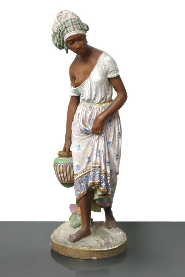 African woman with white dress and jug