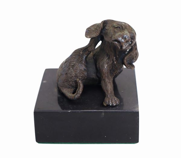 Small dog in bronze