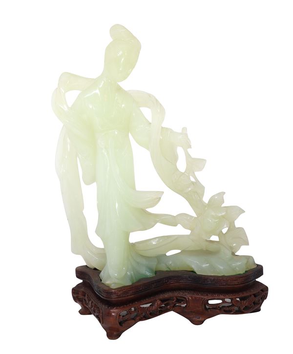 Guanyin in light green jade