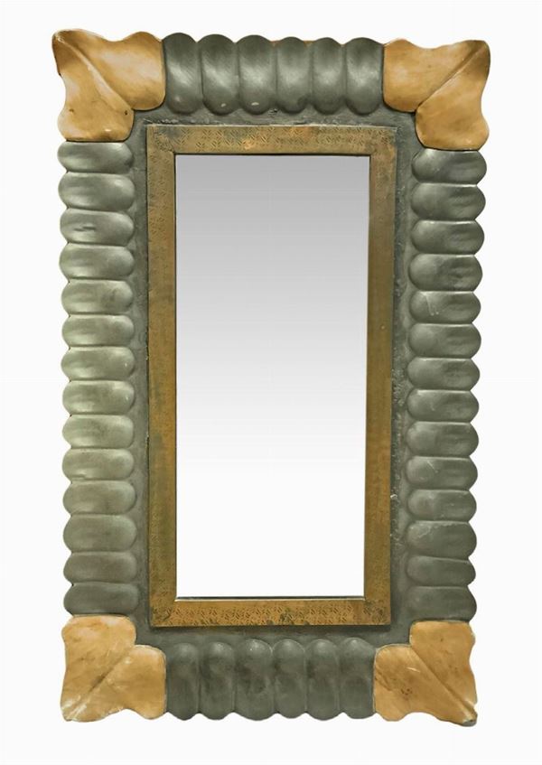 Italian Production in the style of Atelier BorSainti Varedo. Mirror rectangular with burnished brass structure embossed, corners coated leathers, signs of use and minimum wear at the corners. 50s. 73x50 is