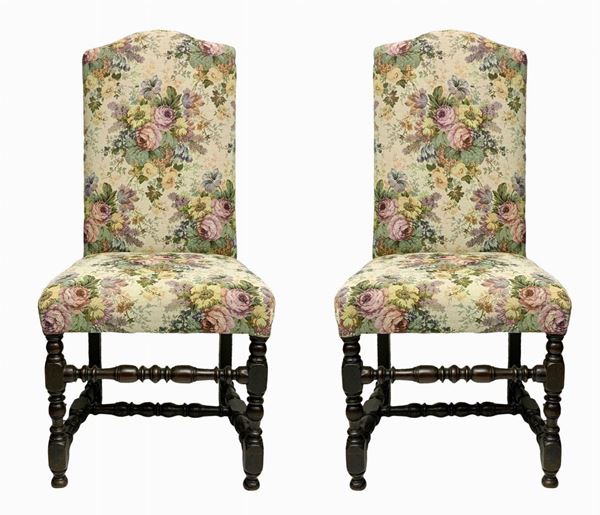 Pair of high chairs, Lombardy, Italy, eighteenth century. High backrest moved in the summit. Turned legs spool with onion foot, linked to H by a turned crossbar. Seat and back padded with floral upholstery in good condition. H 144x55x50