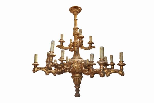 Large chandelier in gilded wood