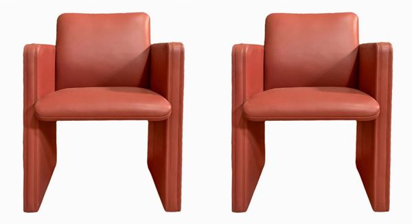 Frau armchair, pairs of armchairs. 90s, metal structure covered in leather in salmon tones, with wheels. Manufacture brand ...