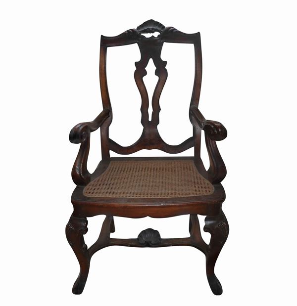 Armchair in walnut wood