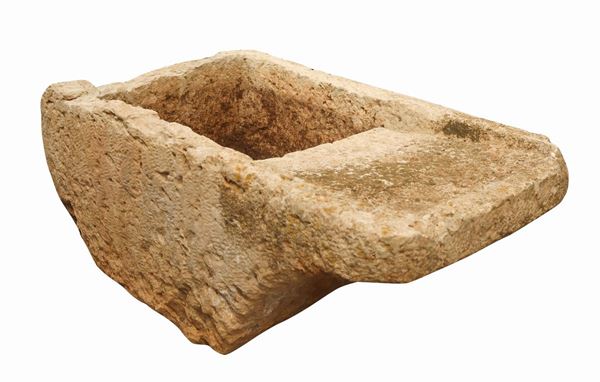 Ancient wash house (pila) in white stone from Noto