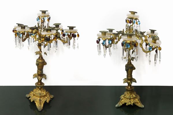 Coppia candelabri in ottone dorato a 7 luci 