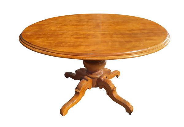 Oval table in light walnut wood