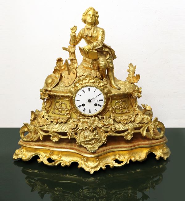 Gold metal clock in display case