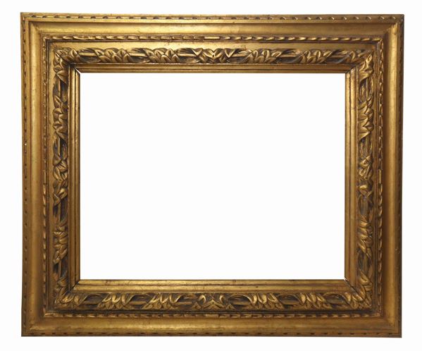 Cornice in legno dorato
