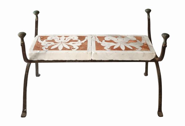 Iron bench with inlaid marble on the top