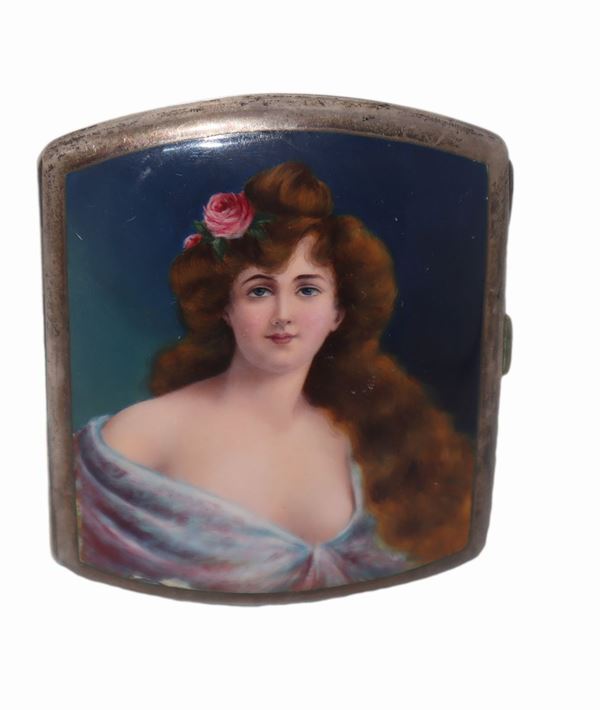 Silver cigarette case with enamel on the lid depicting a woman