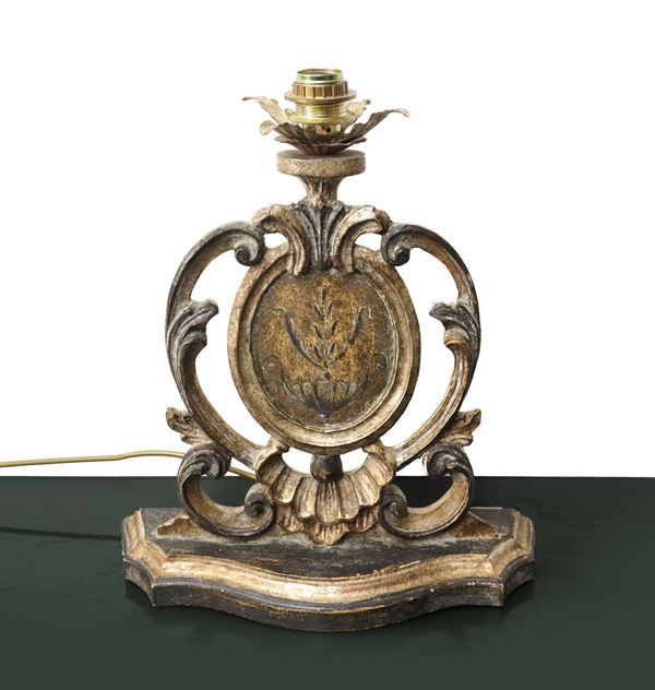 Lacquered, silvered and gilded wooden fragment. Lamp adapted