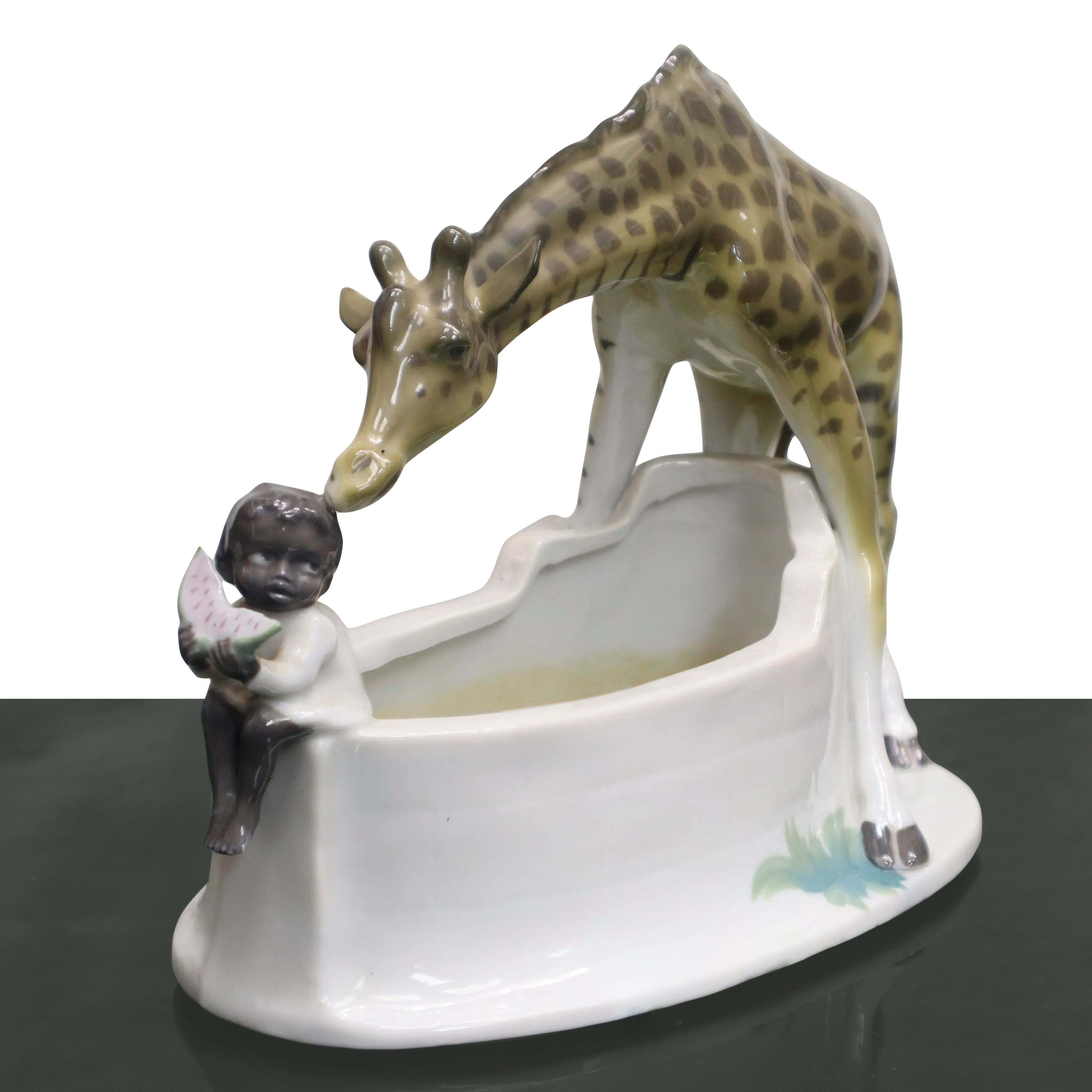 Giraffa con Bimbo che Mangia L'anguria
