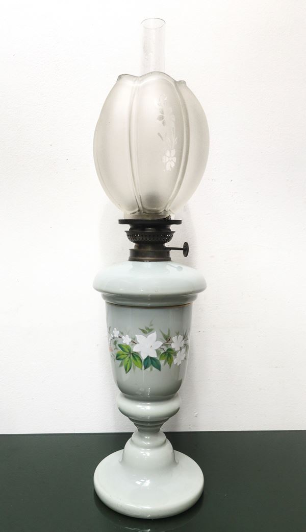 Lamp in shades of gray with floral decorations