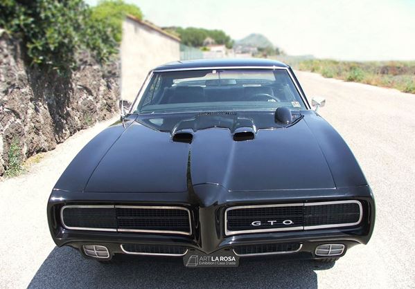 PONTIAC GTO RAM AIR IV (1969)
CHASSIS N. 194375CT
BODY STYLE: closed.

Very rare 1969 Pontiac Gto Ram Air Iv, Only 121 Produced in That Year, Two Door Coupe,
Excellent condition, original interior, engine and body repainted in 2009, in working condition, well kept, ASI certified, 76000 original miles, three-speed automatic transmission, V8 Big Block 6.6 liter (400c.i) engine. Flowmaster exhausts. , Aspiration Holley, Edelbrock heads. Hagerty Oltre rating.