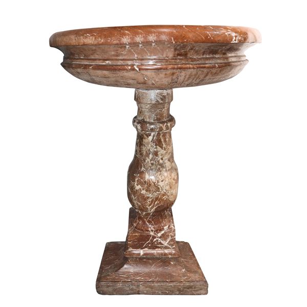 Baptismal font in red Verona marble