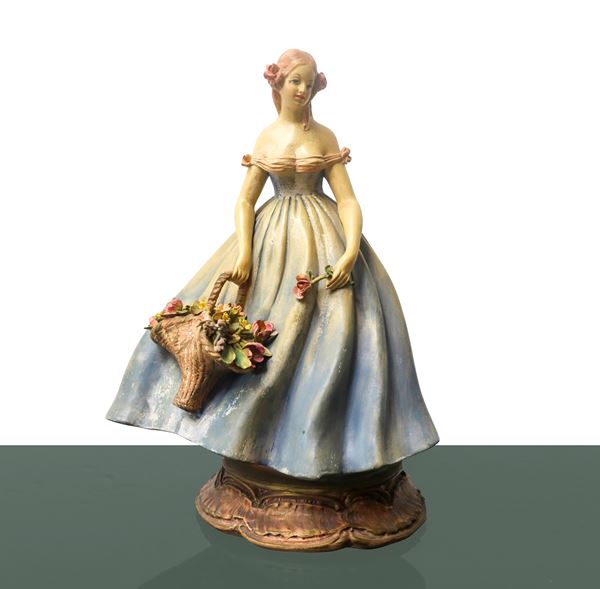 Dama con cesto di fiori, scultura in ceramica policroma
