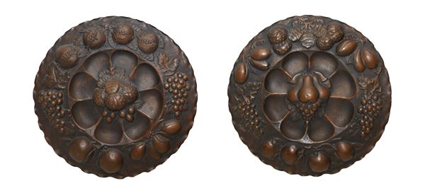 Pair of plates with embossed fruit work