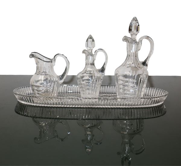 Crystal set composed of oil, vinegar, jug and tray  (20th century)  - Scaled crystal - Auction 10daysAuction! - Casa d'aste La Rosa