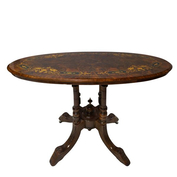 Oval coffee table, four-spoke foot and inlaid top